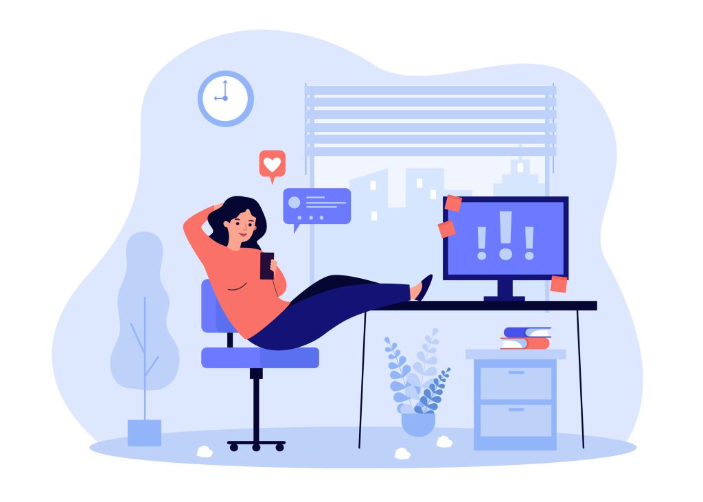 Person at a desk looking at their phone