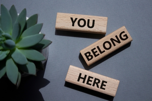 Image with wood blocks reading you belong here